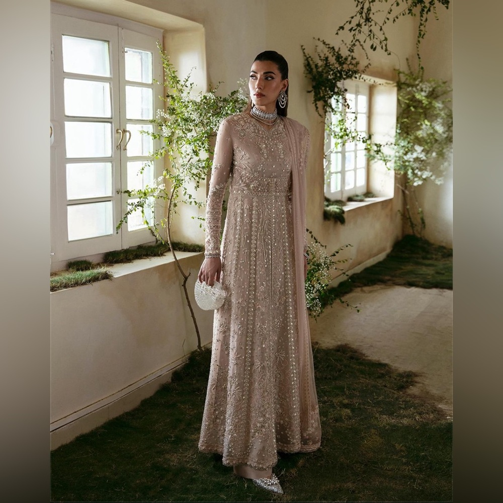 Beautiful Suffuse attire in a soothing nude hue.
